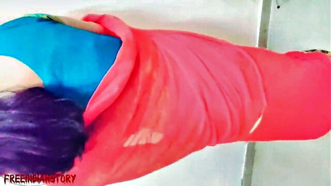 Desi bhabhi wrapped in pink saree over blue top, purple hair tease