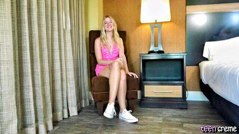 18yo blonde teen Summer in pink mini dress sitting seductively in hotel room