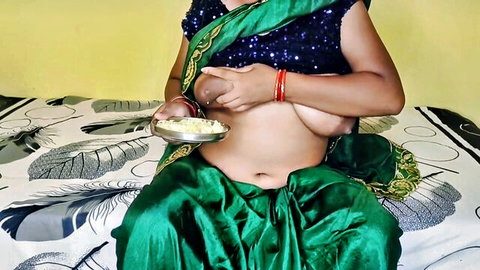 Indian model Ritu exposing big tits in green sari with food bowl, homemade tease