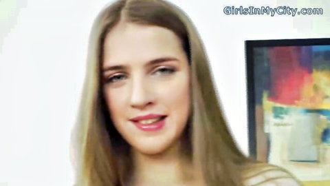Attractive blonde woman smiling seductively in adult video thumbnail