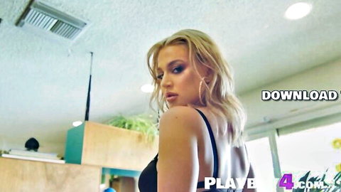 Blake Blossom posing seductively in black lingerie, blonde bombshell