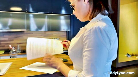 Lady Lyne as horny secretary in white blouse reading papers