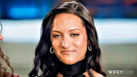 Seductive brunette MILF smirking with choker necklace on Wifey.com