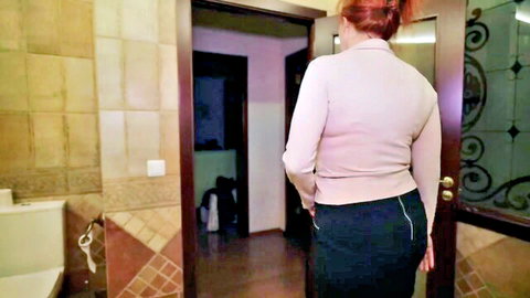 Indigo Sin redhead in tight skirt, back view teasing stepson