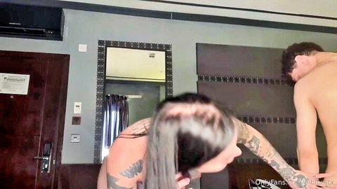 Inked shemale with tattoos bends over for handsome guy in hot encounter