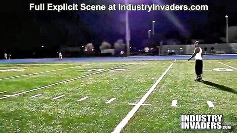 Ebony pornstar Jayla Foxx on football field in explicit outdoor scene