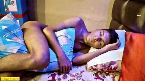 Young Desi boy Sourish naked asleep on bed, slim body and taut booty visible at midnight