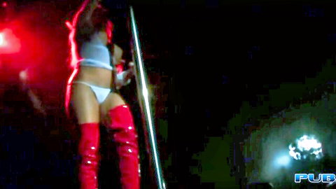 Capri Cavanni pole dancing in white lingerie and red boots