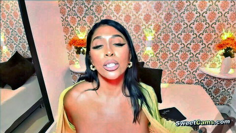 Thick Latina in open robe teasing with toy on cam