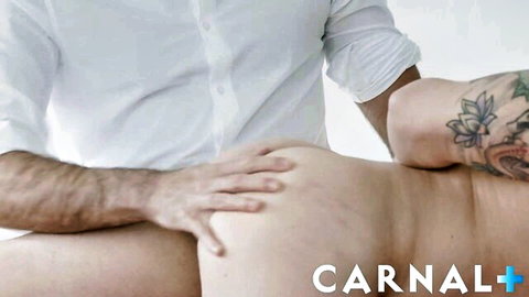 Tattooed woman bent over, groped by man in white shirt in trans sex fantasy