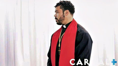 Muscular black priest in red stole, profile view adult thumbnail