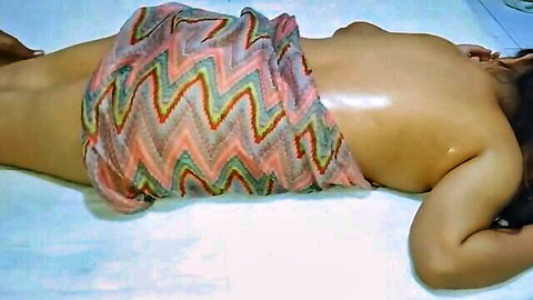 Malay stunner Bini topless and oiled in colorful sarong
