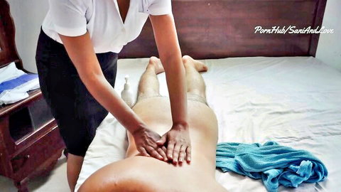 Sri Lankan spa girl in uniform massages nude man's ass in erotic session