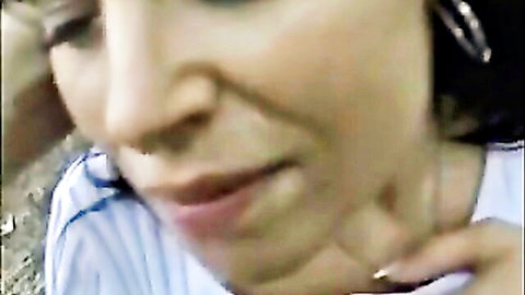 Close-up of amateur Asian woman in blowjob scene