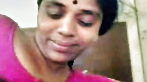 Brown skin Indian bhabhi smiling close-up before sucking hubby's black dick on cam