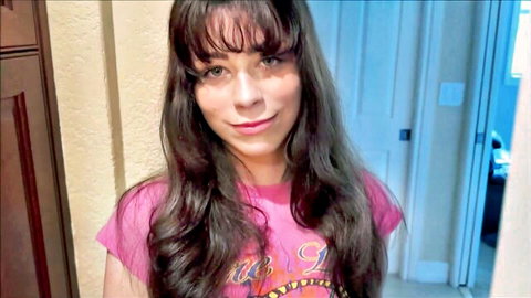 Renee Rose smiling seductively in pink t-shirt, Step Sis adult video thumbnail