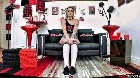 Joey White in 'Anal Only' tank top, thigh-high stockings, seated pose