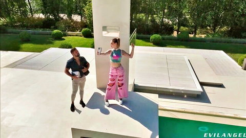Lily Blossom in pink crop top and pants on EvilAngel outdoor set with director