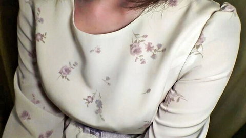 Asian woman in elegant floral blouse, close-up portrait from JAV uncensored
