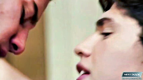Tyler Torro kissing muscular hunk in intimate gay scene
