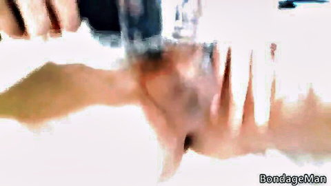 Henrique hand-gagged, mouth stuffed with bandana, cumming in bondage