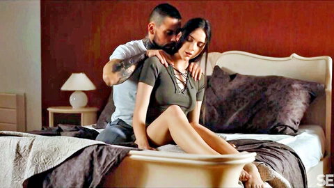 Vixi Rafi in sexy lace-up top, embraced by lover in intimate bedroom tease