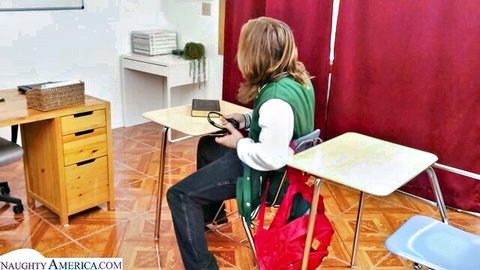 Ophelia Kaan as blonde teacher in seductive classroom pose