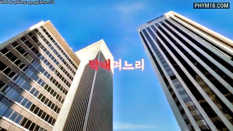 Korean girl in urban Seoul skyline with tall buildings