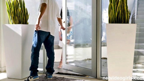 Naomi in sexy dress greets man at door - NetVideoGirls amateur tease