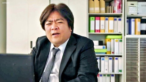 Middle-aged Asian man in suit at desk, Taoyuan escort ad promo