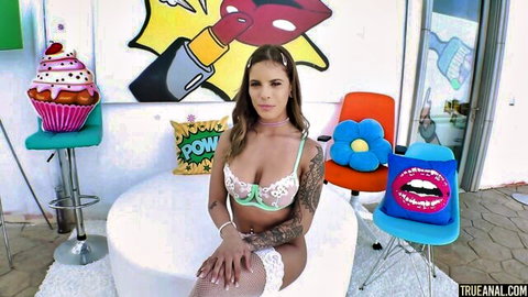 Jesse Pony in white lingerie and stockings, teasing for anal fun