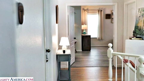 Isa Bella enters bedroom hallway in My Sister's Hot Friend scene