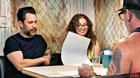 Leana Lovings in BDSM threesome negotiation with tattooed men