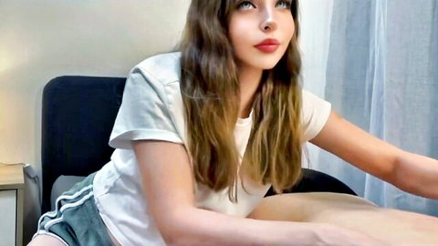 Gorgeous Latina in white tank top and shorts teases seductively