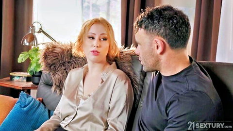 Felice Morgan in silky robe seducing lover on couch