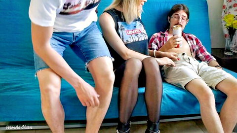 Blonde amateur escort in fishnets teases two guys in threesome setup