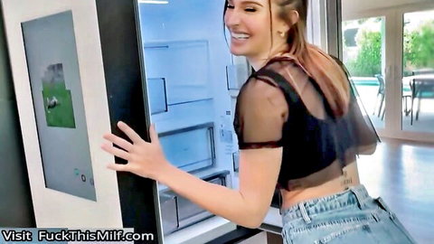 Hot blonde roommate in sheer top and denim shorts at fridge