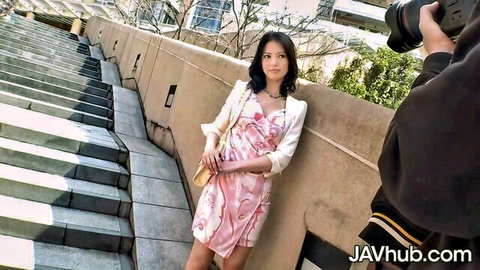 Sexy Japanese brunette in pink floral dress and blazer posing on outdoor stairs for JAVhub photoshoot