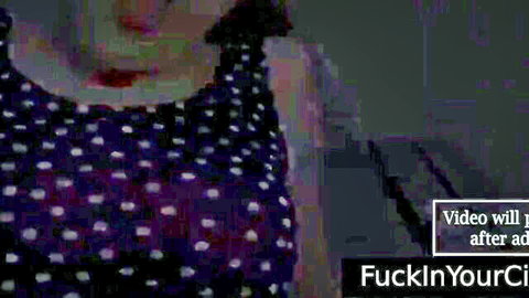 Busty babe in tight polka dot top teasing massive cleavage