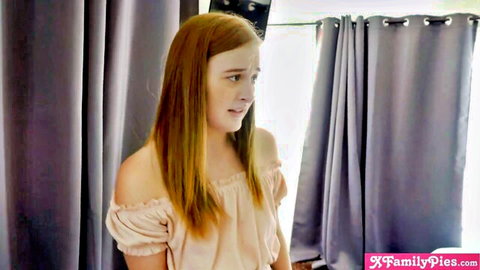 Redhead step sister Danni Rivers looking worried in off-shoulder top
