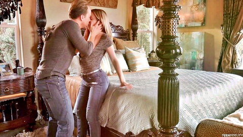 Aubrey Sinclair passionately kissing partner in steamy bedroom scene