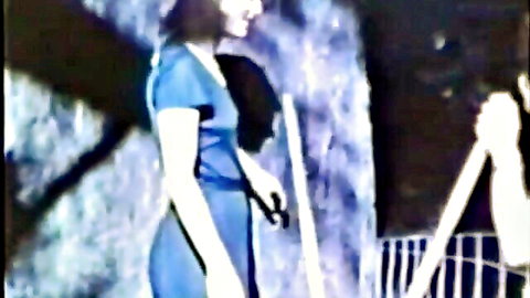 Vintage gardener in tight blue dress, classic porn tease