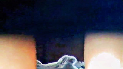 Blurry upskirt of young wife's spread thighs teasing white panties underneath