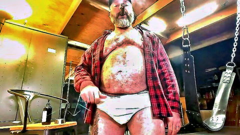 Burly Daddy Kurt smoking and stroking in white briefs, hairy bear body