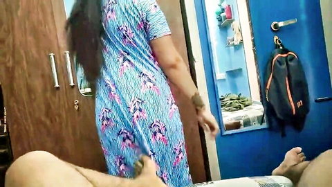 Curvy Indian MILF in floral dress teasing from behind