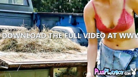 Blonde natural MILF posing in red lace bra and denim shorts by truck