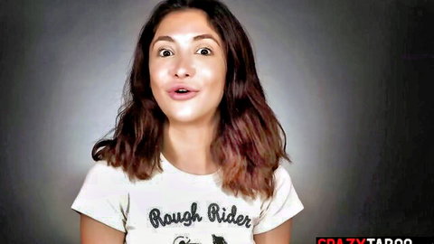 Jane Wilde wide-eyed in Rough Rider t-shirt, teasing solo masturbation