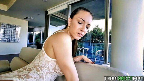 Alexis Rodriguez in seductive white lace lingerie pose