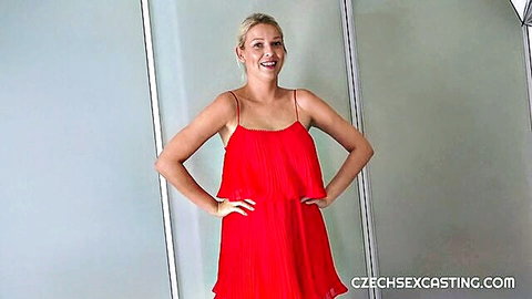 Busty Czech MILF Karol Lilien poses in red dress at casting