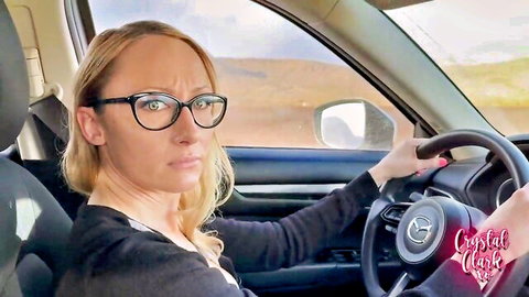 Crystal Clark as stern blonde stepmom driving to college in glasses